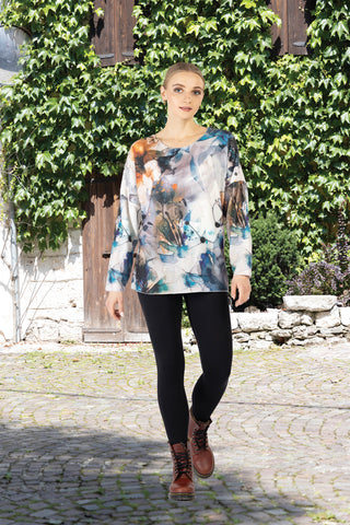 abstract brushstroke boat neck top with long sleeves and brown boots