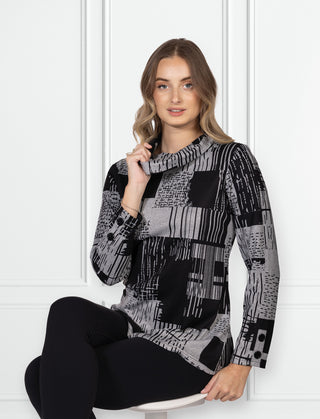 black and grey abstract cowl neck top with long sleeves and buttoned cuffs